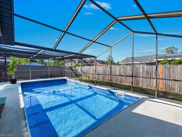 Pool with screened enclosure