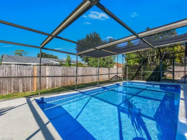 Pool with screened enclosure
