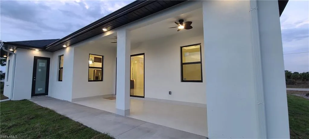 View of patio featuring ceiling fan
