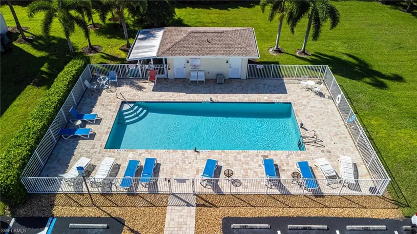 Community pool featuring a patio area
