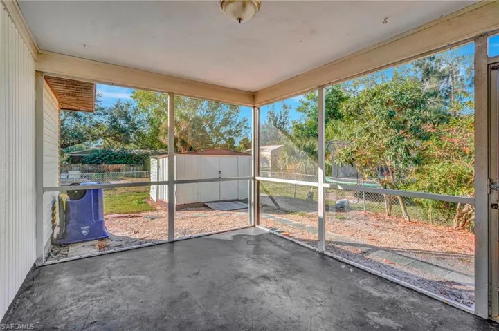 Unfurnished sunroom with plenty of natural light