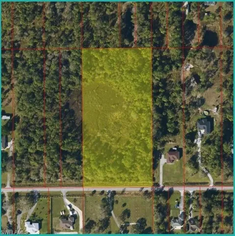 Aerial overview of property's location featuring property parcel outlined