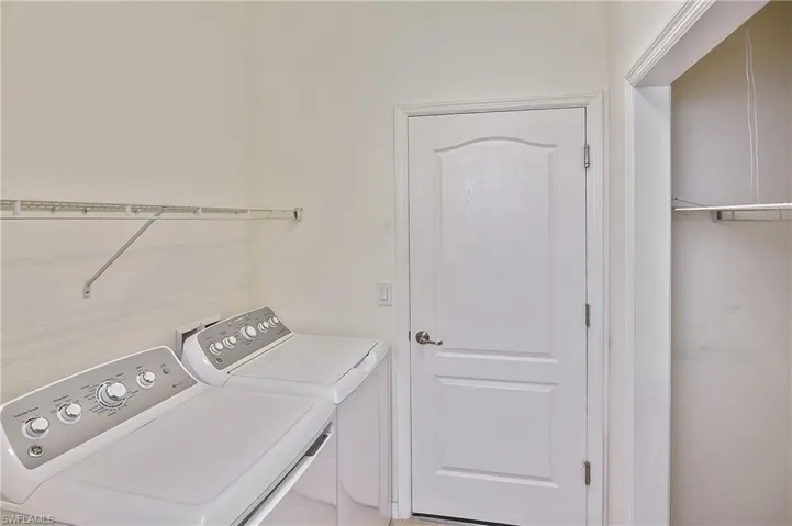 Laundry room featuring washer and dryer and washer hookup