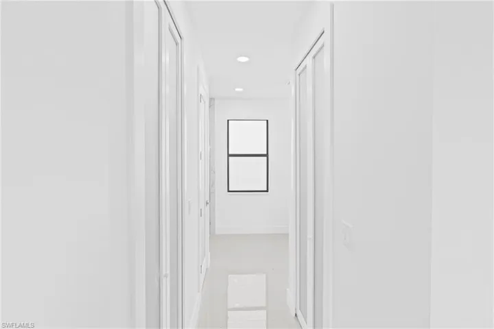 Hall featuring recessed lighting