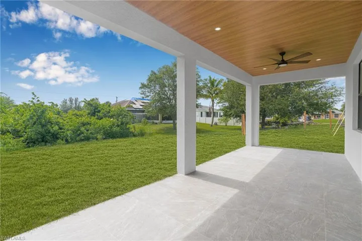 View of patio with a ceiling fan
