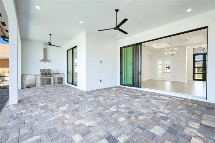 View of the lounge area in large lanai and the entrance to the living room