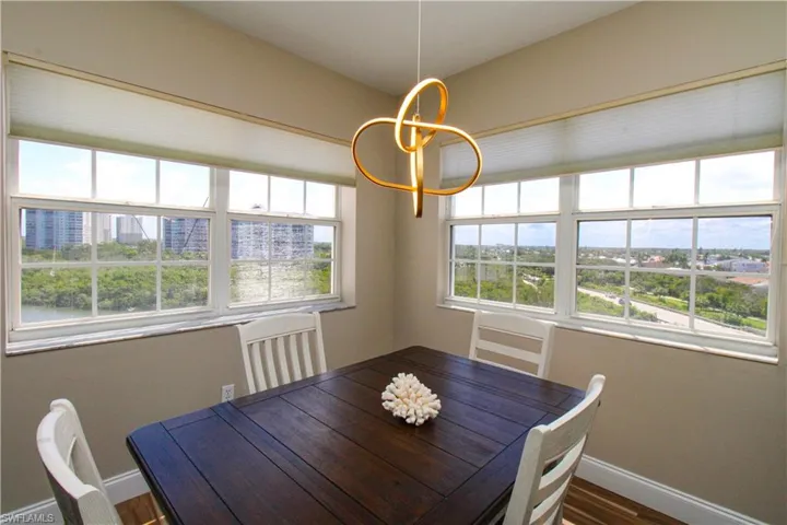 Unfurnished dining area featuring wood-type flooring
