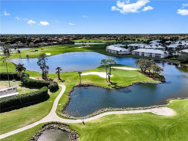 Aerial view featuring a water view of the Golf Course