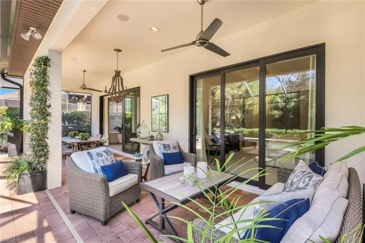 View of patio featuring ceiling fan and outdoor lounge area