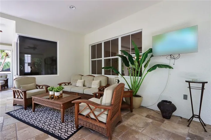 Living area with stone tile flooring