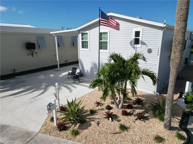 View of side of property with a patio