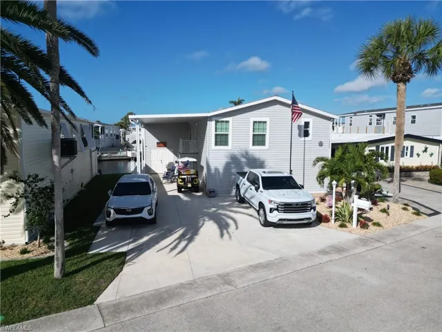 View of front facade featuring concrete driveway