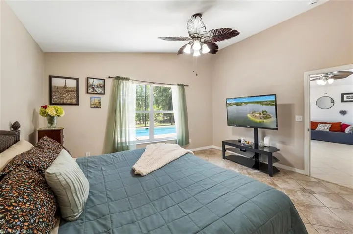 Vaulted ceilings complemented by a ceiling fan with integrated lighting