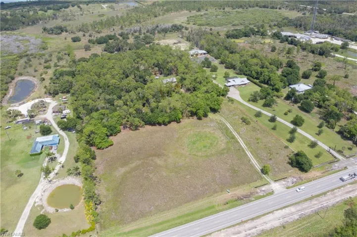 View of property location with a nearby body of water