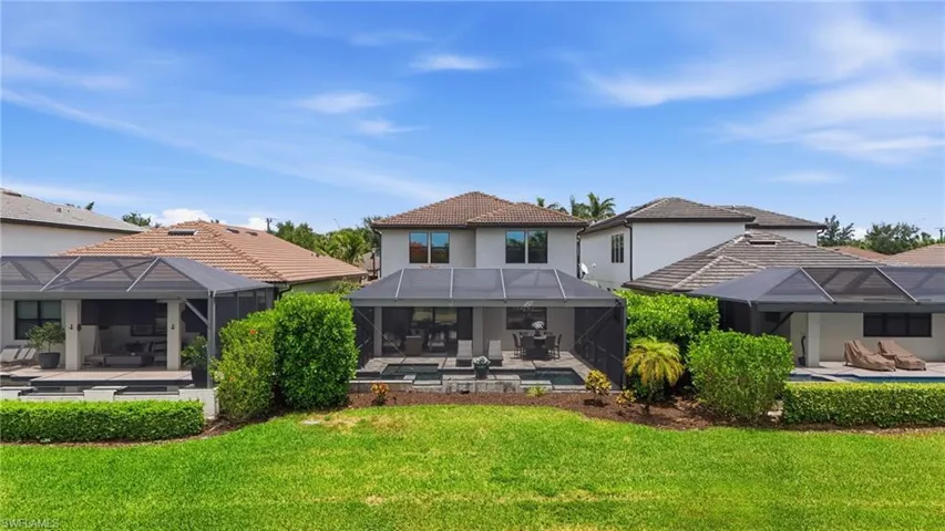 Spacious yard with lake views.