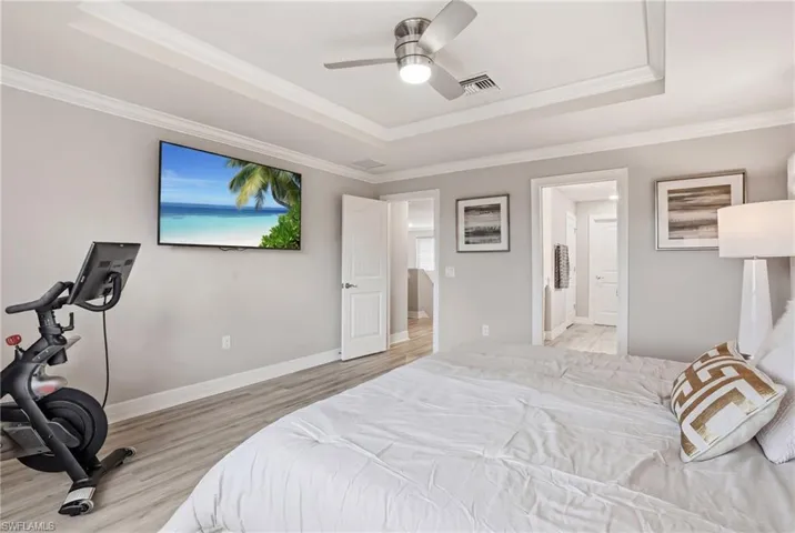 Tray ceiling with fan.