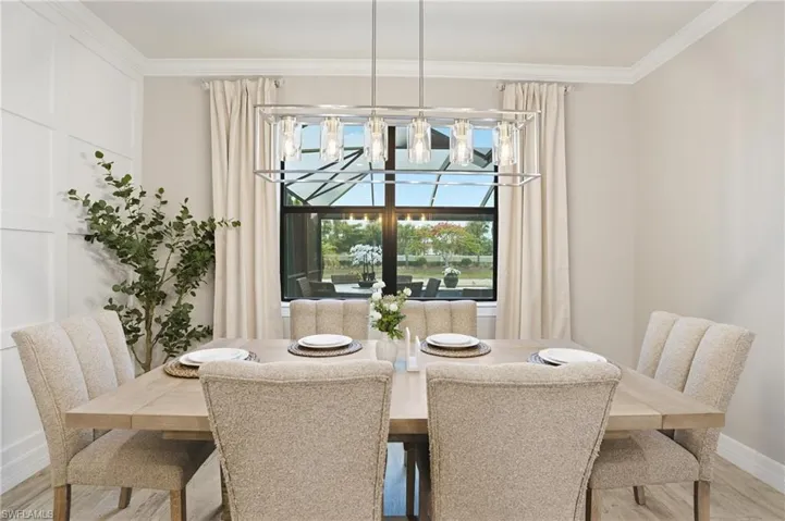 Dining area is right off the kitchen also has a lakeview.
