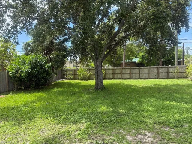 View of fenced backyard