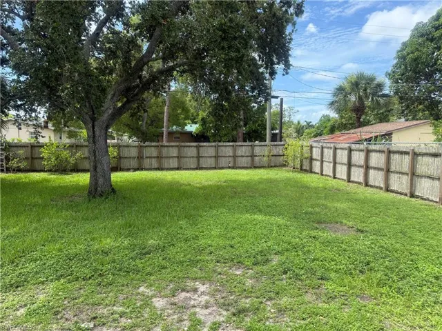 View of fenced backyard