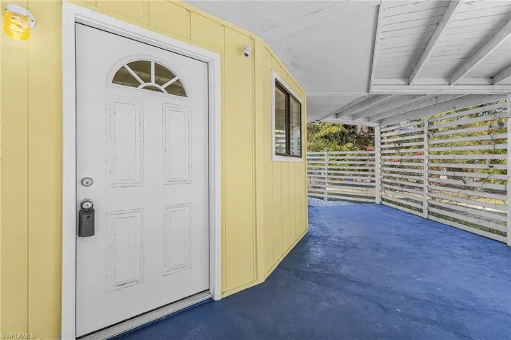 Entrance to property featuring a patio