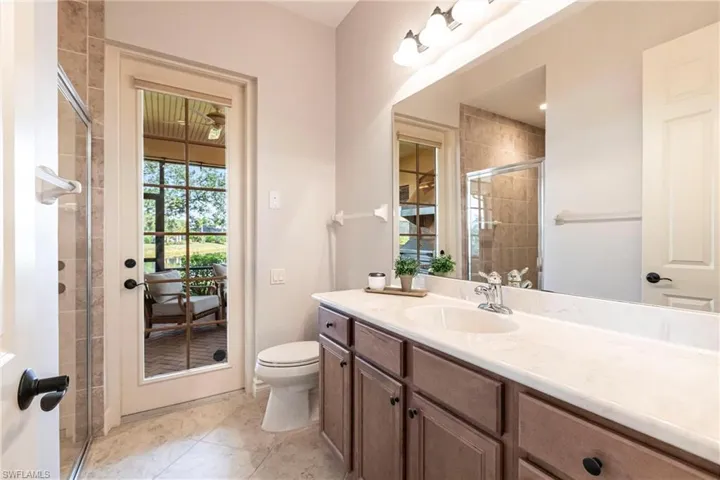 Full bath to outdoor kitchen and pool deck