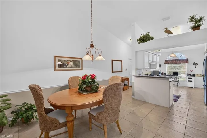 Looking to kitchen ; note the high ceilings
