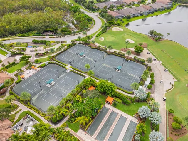 Bird's eye view of a nearby body of water and a golf course