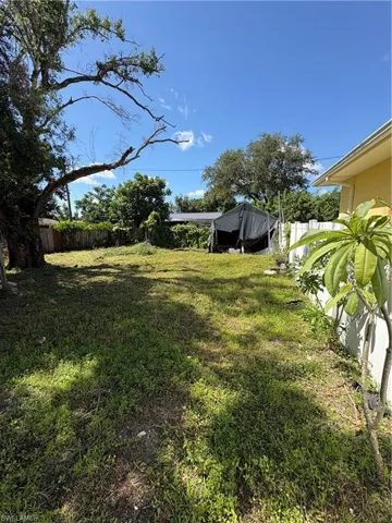 View of fenced backyard
