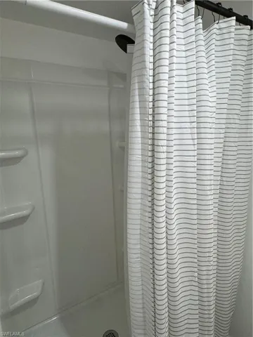 Bathroom with a shower stall