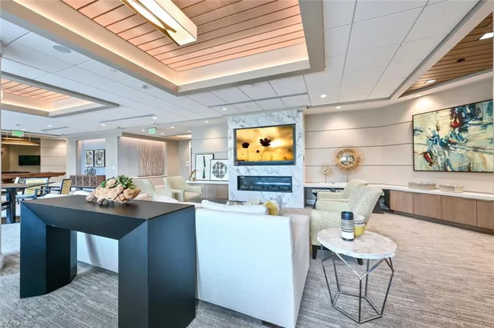Fireplace, large screen TV & multiple sitting areas