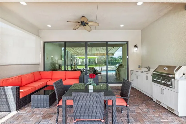 Outdoor oasis with kitchen and covered lanai space