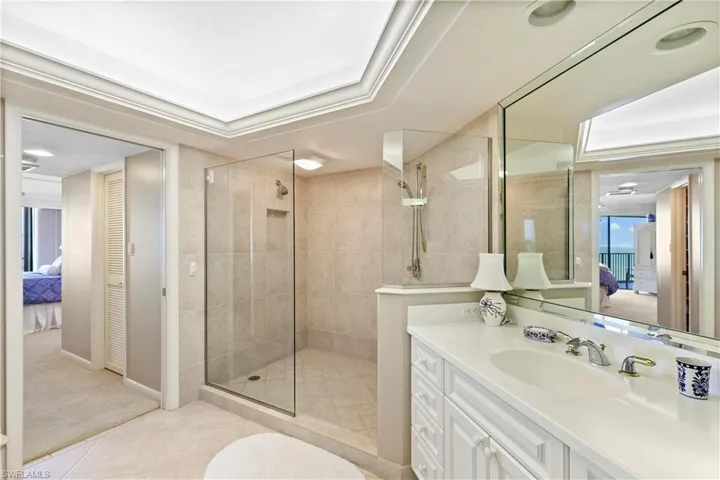 Double sinks to match his an hers walk-in closets