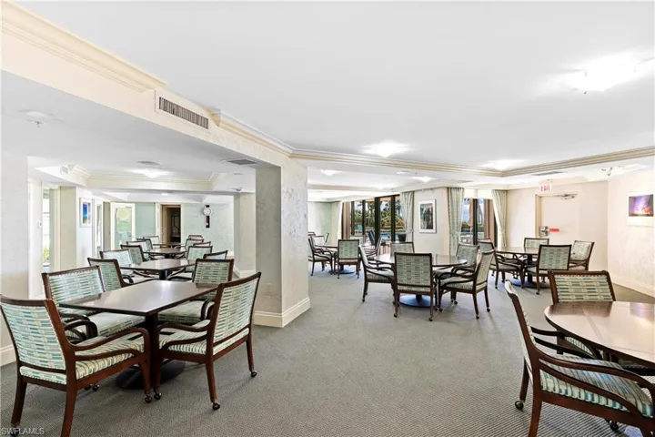 Social Room with full kitchen overlooking the pool area