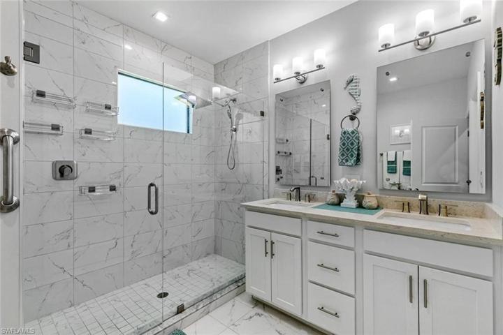Owner's suite bathroom, upgraded frameless shower