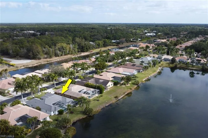 Aerial overview of property's location with nearby suburban area