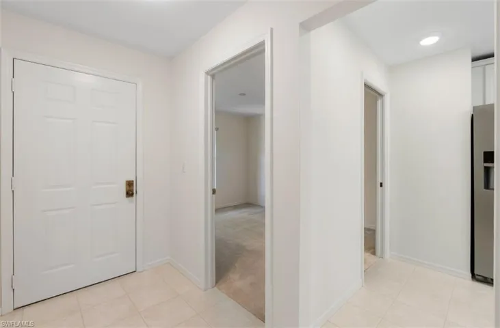 Entry hall way, where office/3 bedroom and kitchen are located.