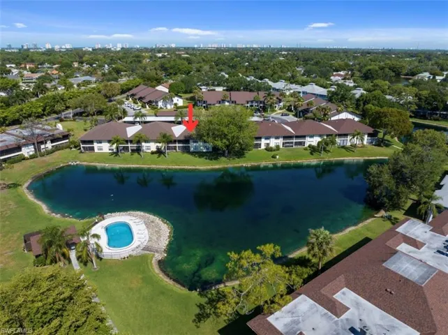 Aerial View of the building structure showing where the unit is located and beautiful lake view