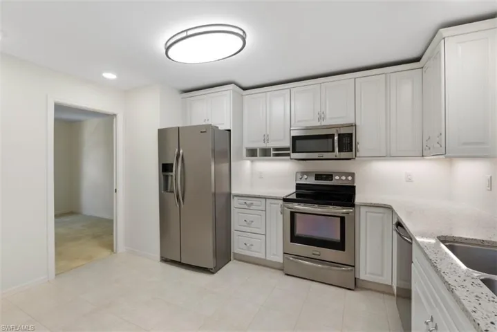 stainless steal appliances and updated lighting, under cabinet and recessed.
