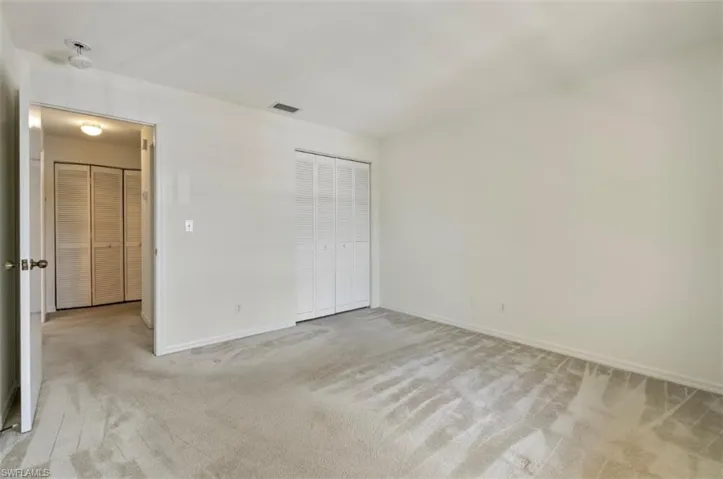 2nd Bedroom located across the laundry unit and bathroom.