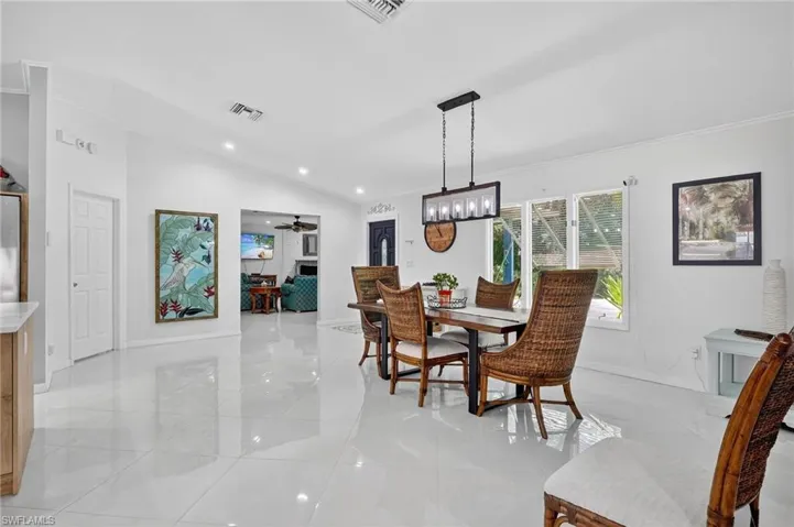 Large spacious dining area perfect for entertaining guests.