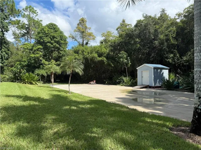 Rear circle drive/pad for RV/boat/truck parking or optional garage/carport/workshop. Moveable new storage shed.