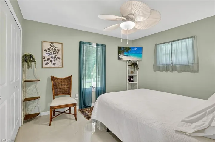 2nd Bedroom includes mounted corner TV.
