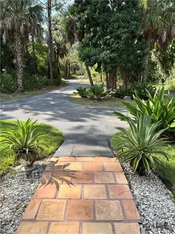 View of street from covered front porch.