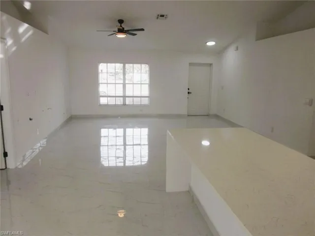Unfurnished room featuring ceiling fan and recessed lighting