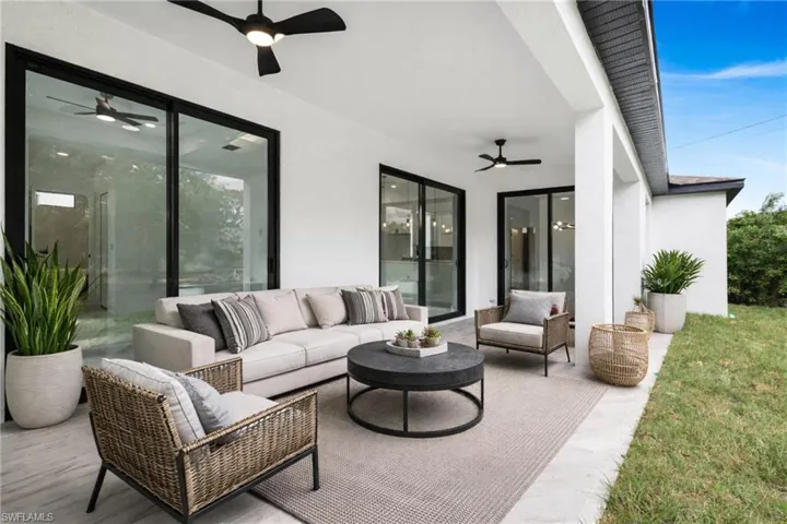 View of patio / terrace featuring an outdoor hangout area and ceiling fan