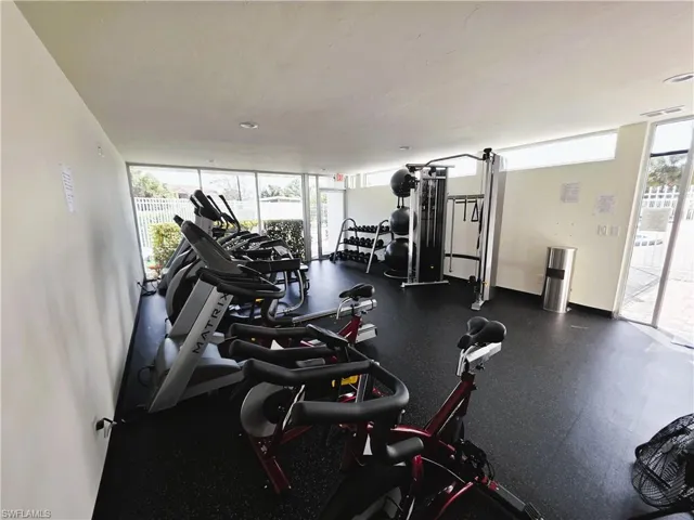 Gym featuring expansive windows
