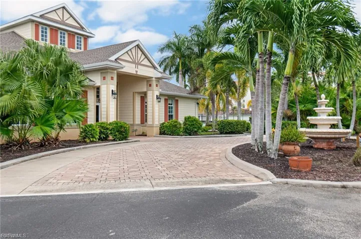 View of front of property featuring a shingled roof