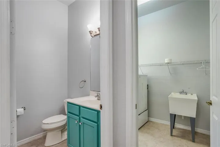First Floor Powder Room and Separate Laundry Room