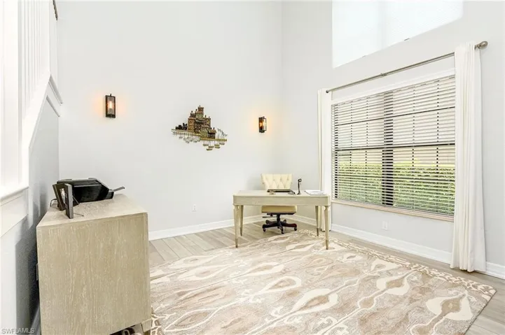 Office area featuring light hardwood / wood-style flooring