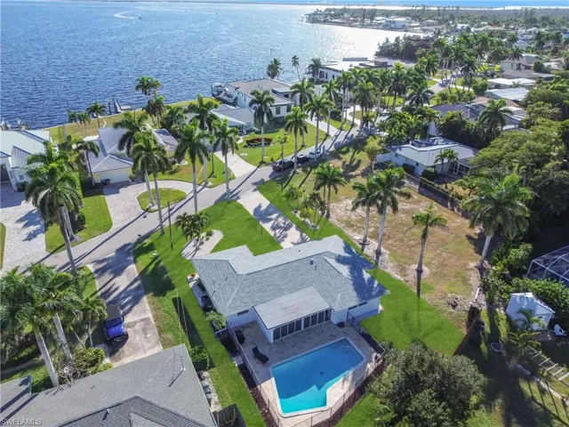 Aerial view of residential area with a large body of water